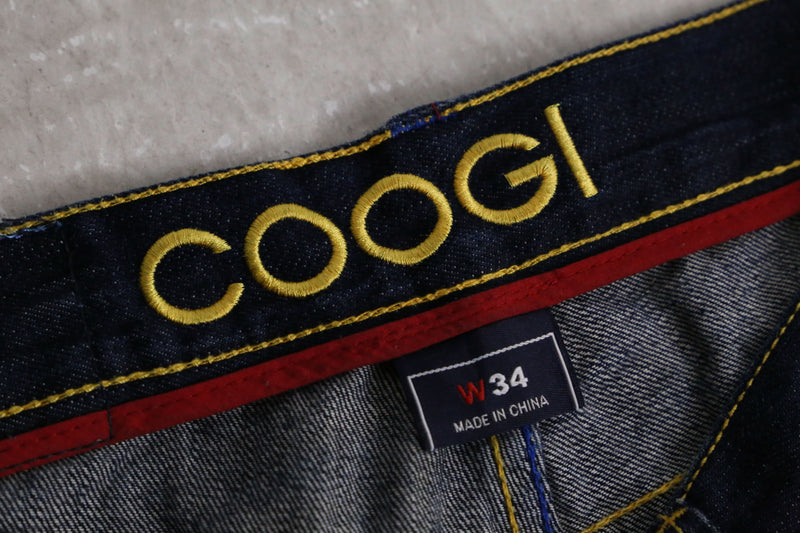 “COOGI” guitars embroidery buggy short denim pants