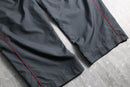 2000s NIKE side piping nylon pants