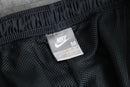 2000s NIKE side piping nylon pants