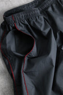 2000s NIKE side piping nylon pants