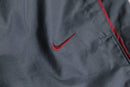 2000s NIKE side piping nylon pants