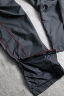 2000s NIKE side piping nylon pants