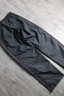 2000s NIKE side piping nylon pants