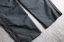 2000s NIKE side piping nylon pants