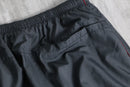 2000s NIKE side piping nylon pants