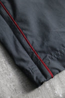 2000s NIKE side piping nylon pants