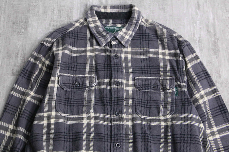 “Wool Rich” over check cotton flannel shirt