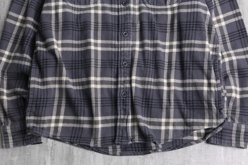 “Wool Rich” over check cotton flannel shirt