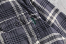 “Wool Rich” over check cotton flannel shirt