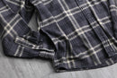 “Wool Rich” over check cotton flannel shirt