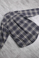 “Wool Rich” over check cotton flannel shirt