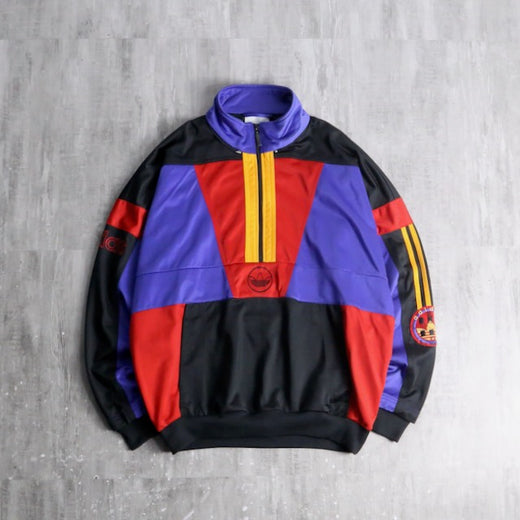 80’s “adidas” mulch panel track jacket.