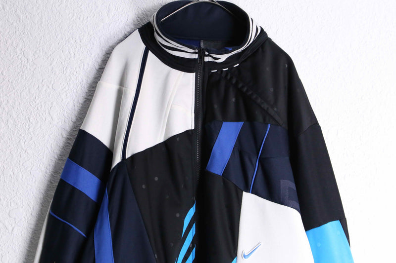 "Re:make" random patchwork blue track jacket