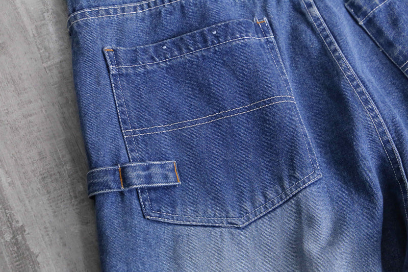 patch design over denim short pants