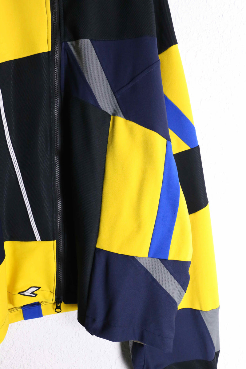 "Re:make" yellow tone random patchwork track jacket