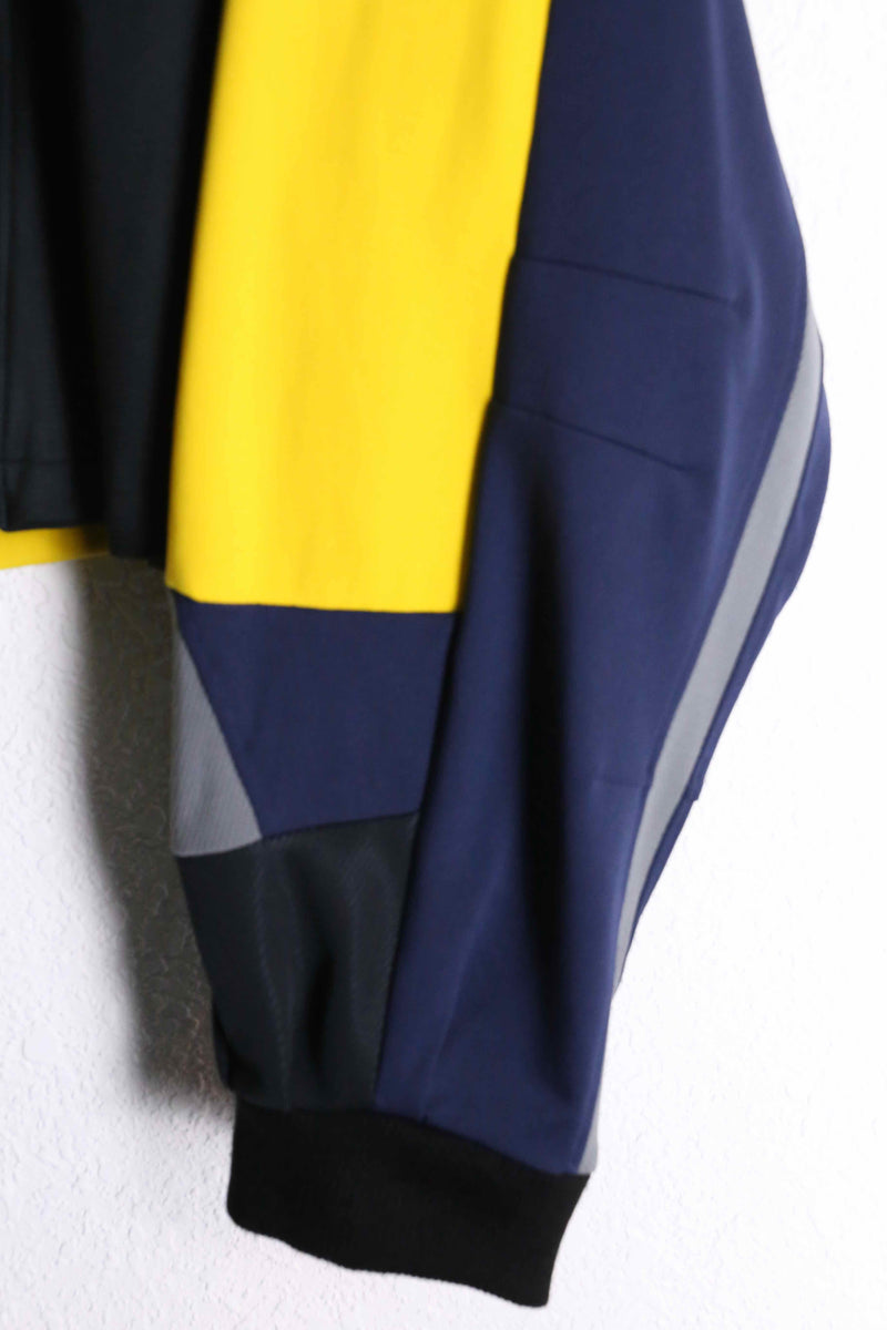 "Re:make" yellow tone random patchwork track jacket