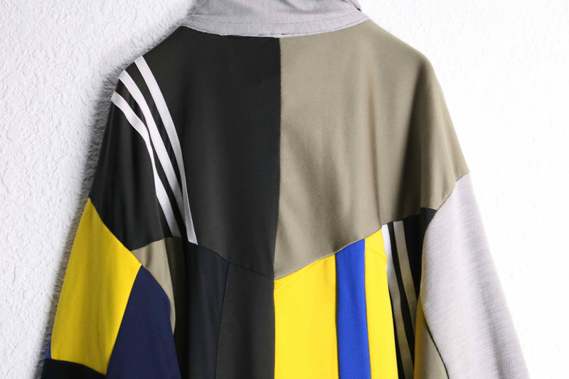 "Re:make" yellow tone random patchwork track jacket