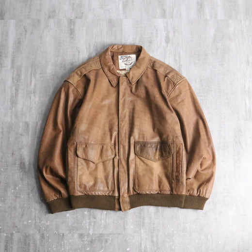 80’s fade brown a-2 type leather jacket