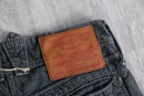 “Levi’s” Strauss & Co. Collectibles black stripe tapered denim trousers