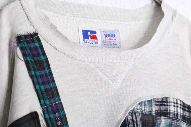 "Re:make" patchwork docking design sweat