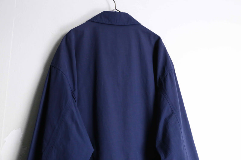 “Burberry’s” navy color front fly half coat