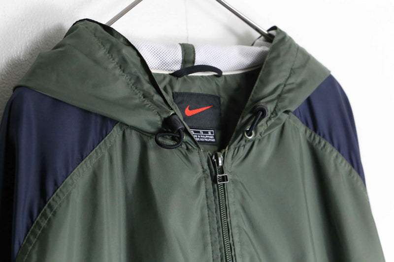 "NIKE" fishtale silhouette over nylon jacket