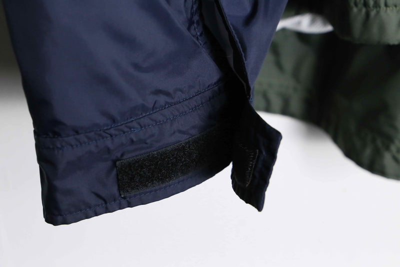 "NIKE" fishtale silhouette over nylon jacket